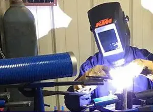 person welding